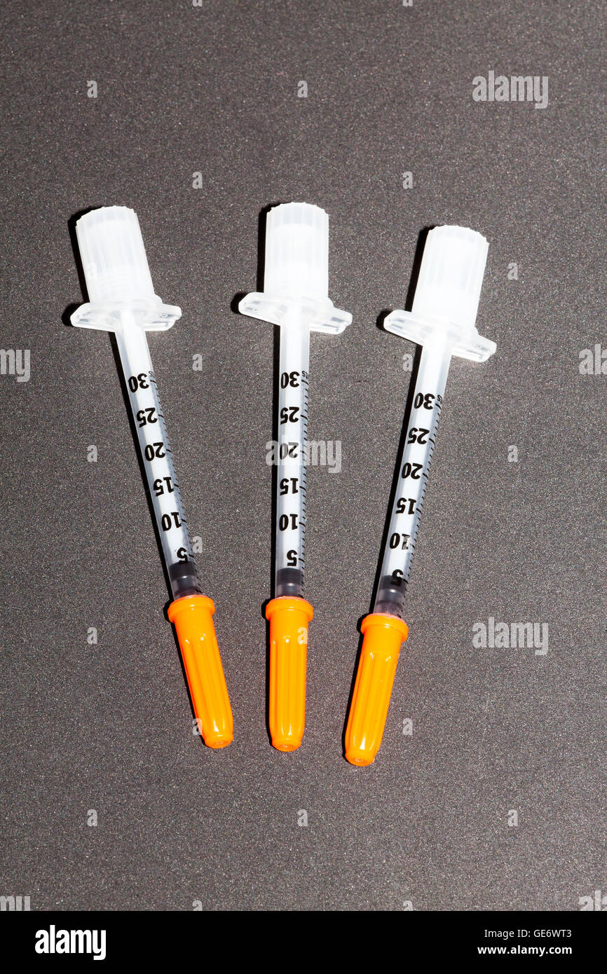 Insulin Needles On Pills And Tablets Stock Photo - Download Image
