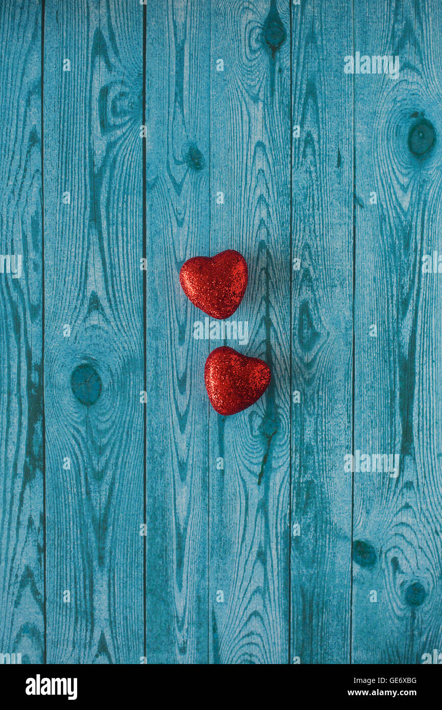 Patterns And Designs Of Green Wooden Heart On Blue Background With