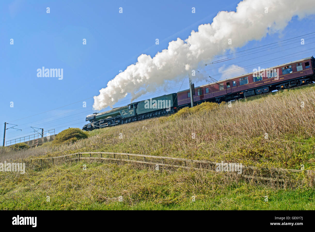 The Flying Scotsman engine and heritage train travelling through Northumberland, England, UK Stock Photo