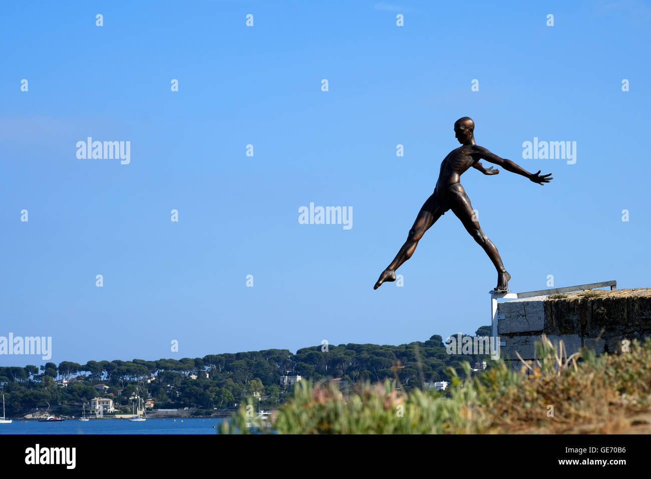 A Nicolas Laverenne sculpture positioned overlooking the bay in antibes, France Stock Photo
