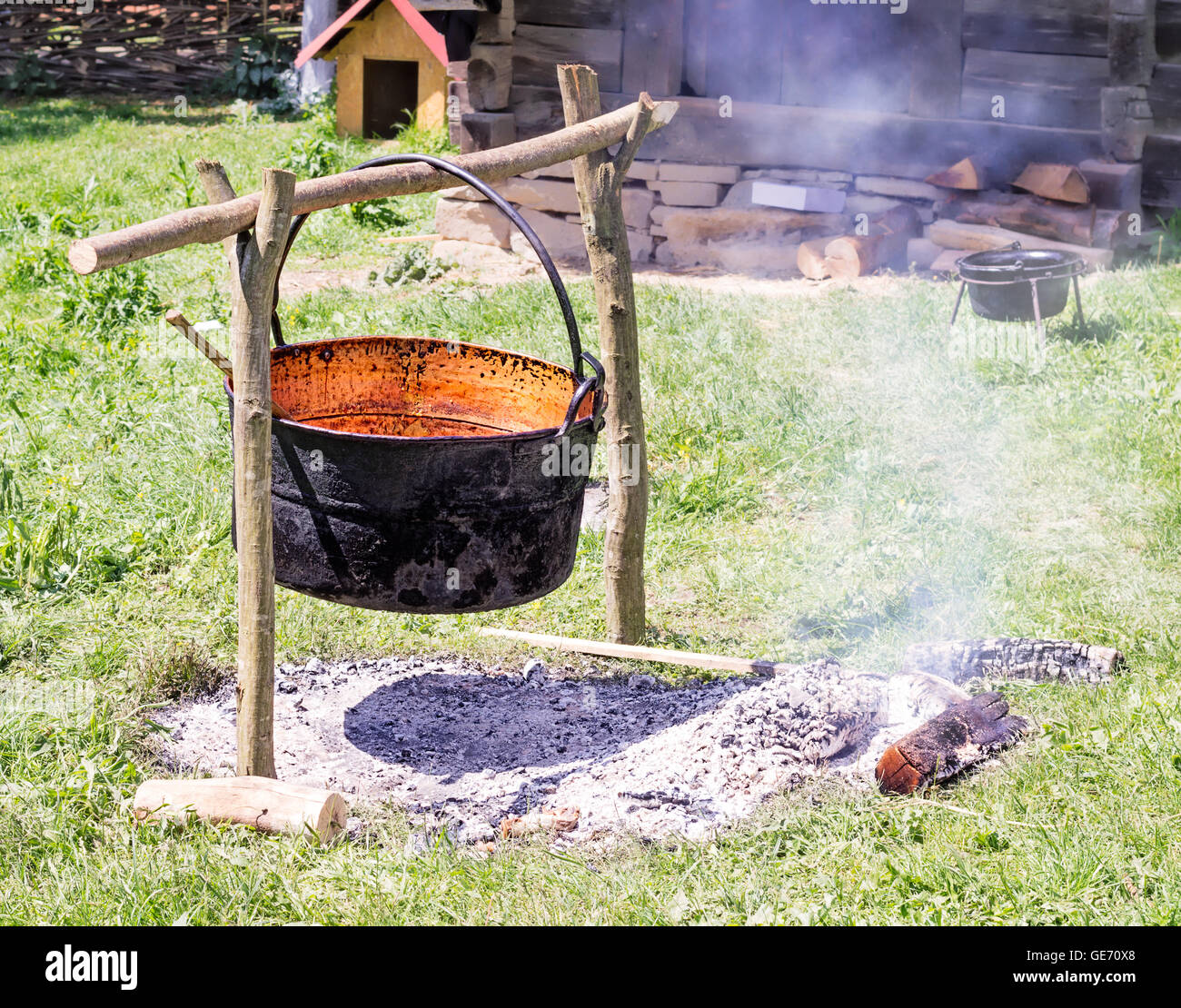 Hanging cast iron pot hi-res stock photography and images - Alamy
