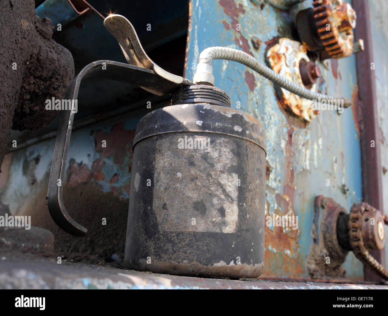 Thumb pump oil can Stock Photo Alamy