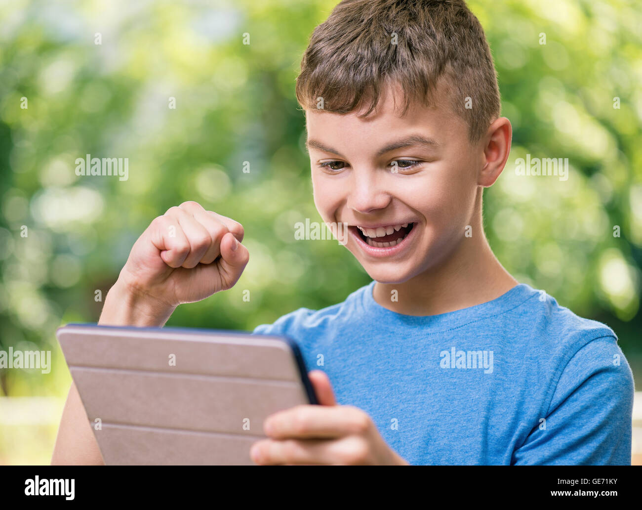 Boy with tablet Stock Photo