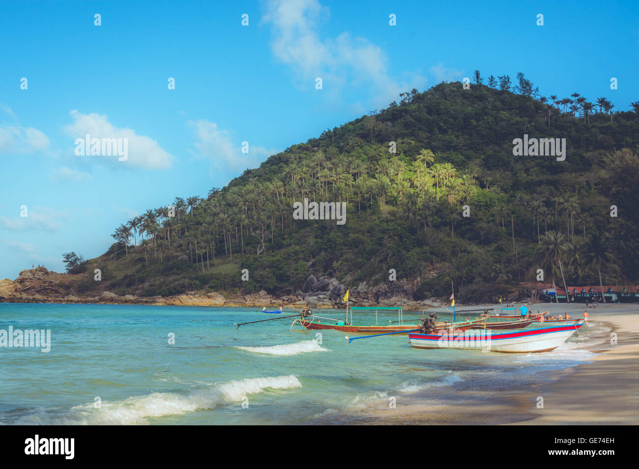 Boats anchored at Bottle Beach, Koh Pha Ngan, Thailand Stock Photo