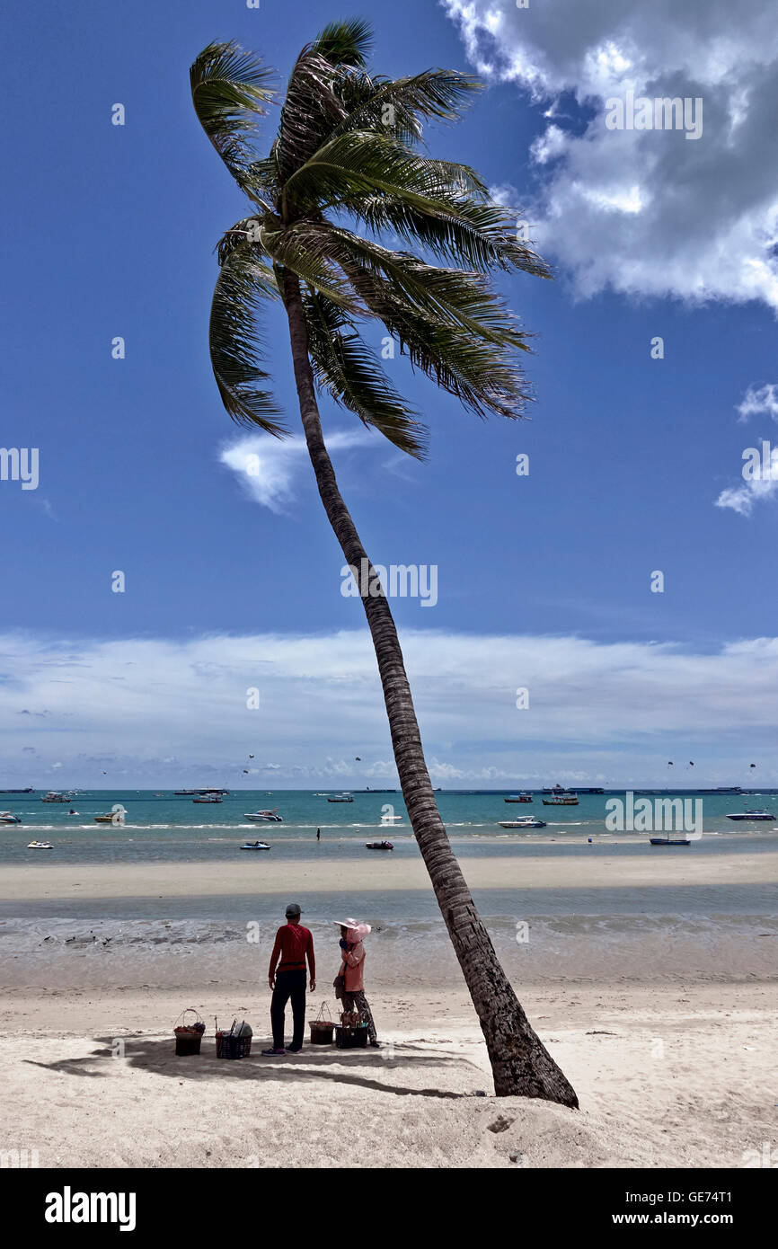 Pattaya beach with palm trees and deep blue summer sky.  Thailand S. E. Asia Stock Photo