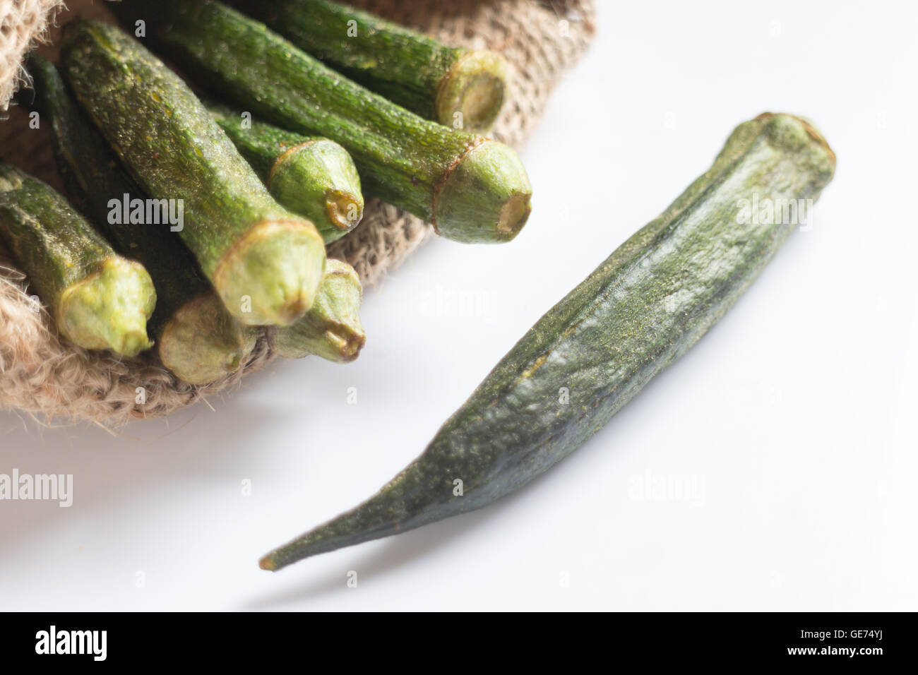 Healthy okra chips on clean background, stock photo Stock Photo Alamy
