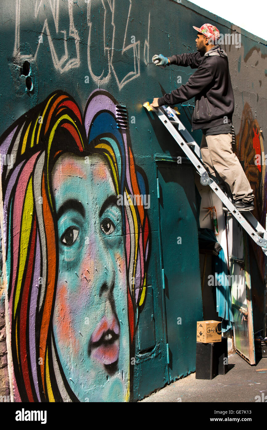 Ireland, Dublin, Temple Bar, The Icon Walk, grafitti artist spray