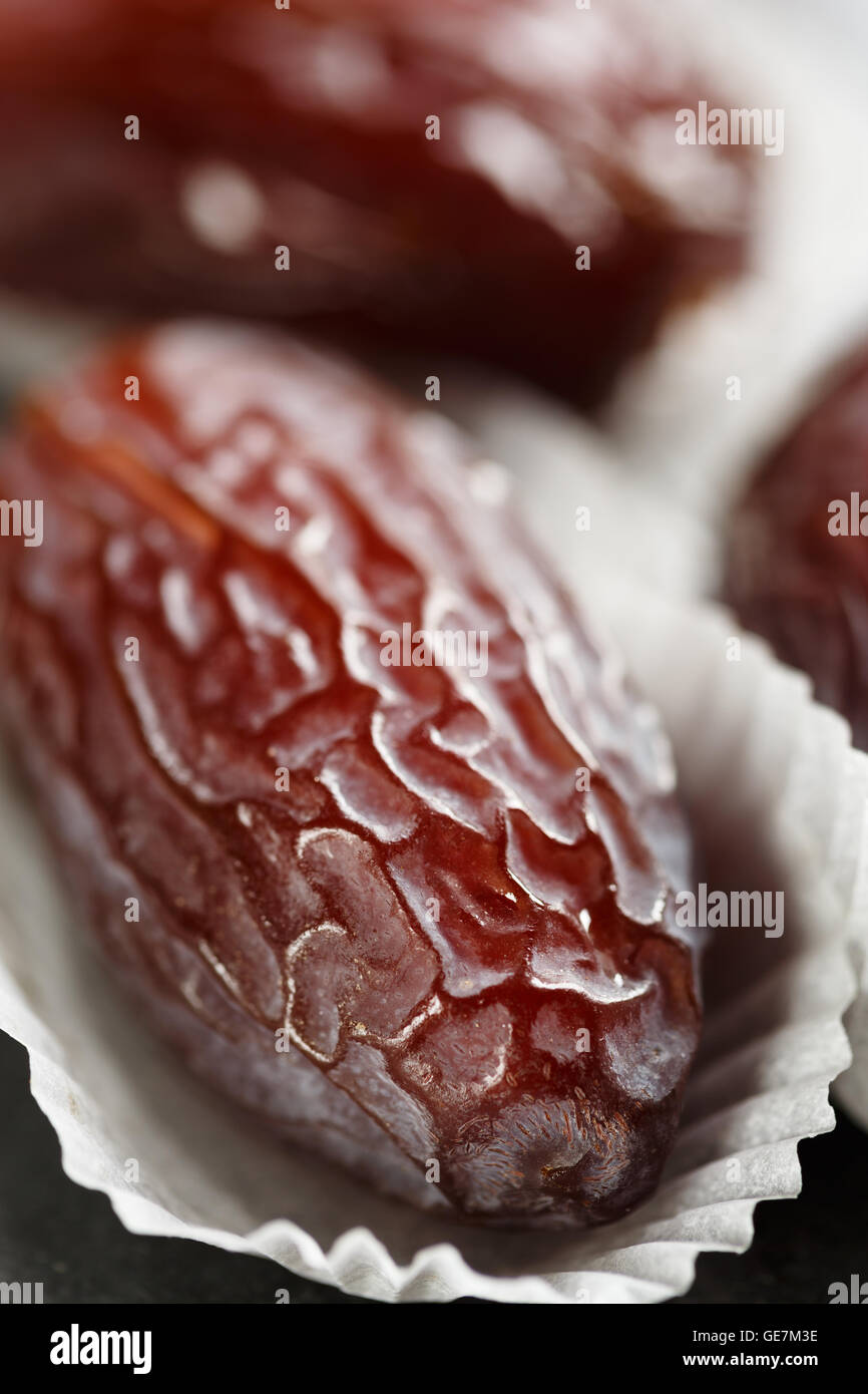 Medjool dates in chocolate cases Stock Photo Alamy