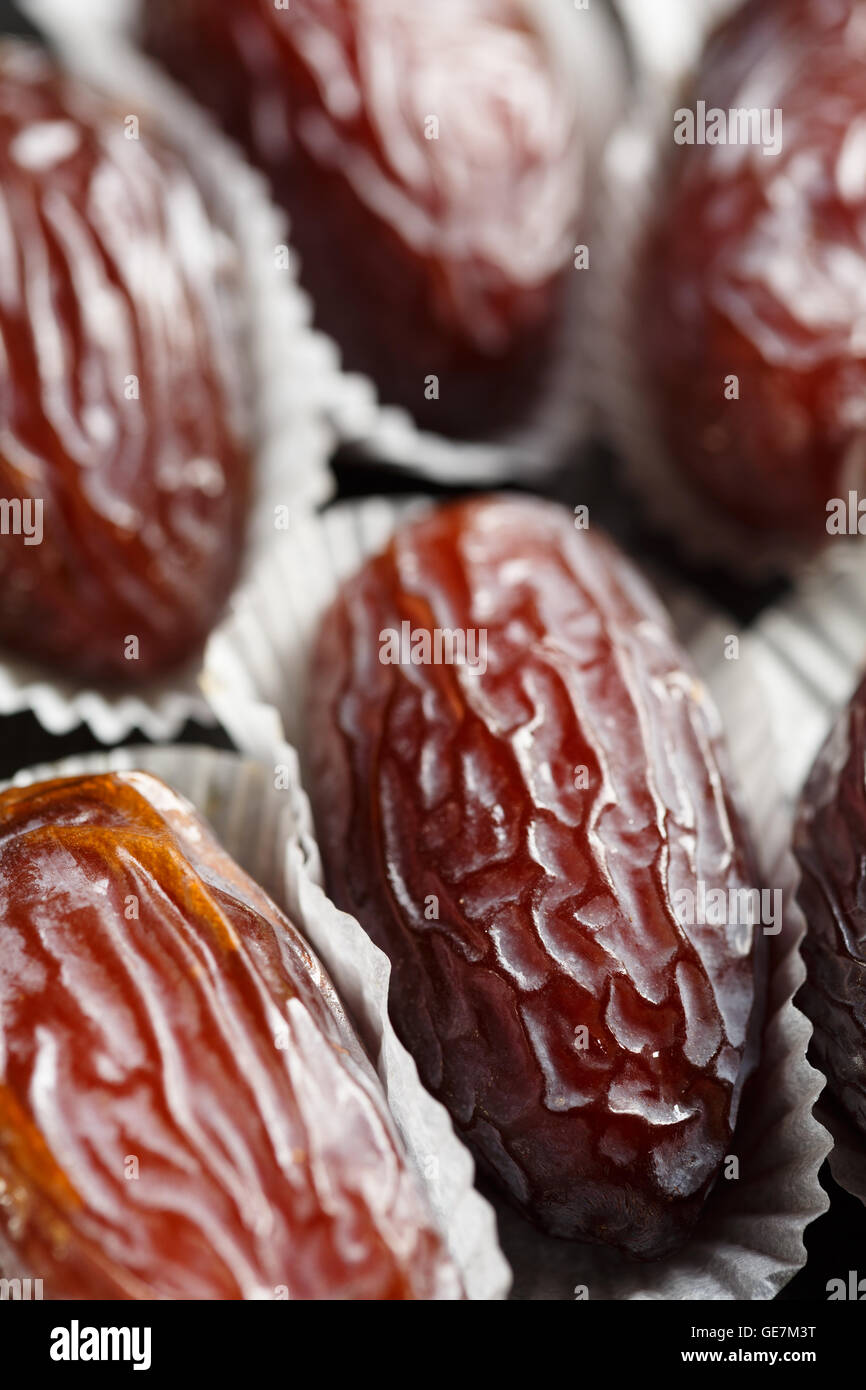 Medjool dates in chocolate cases Stock Photo Alamy