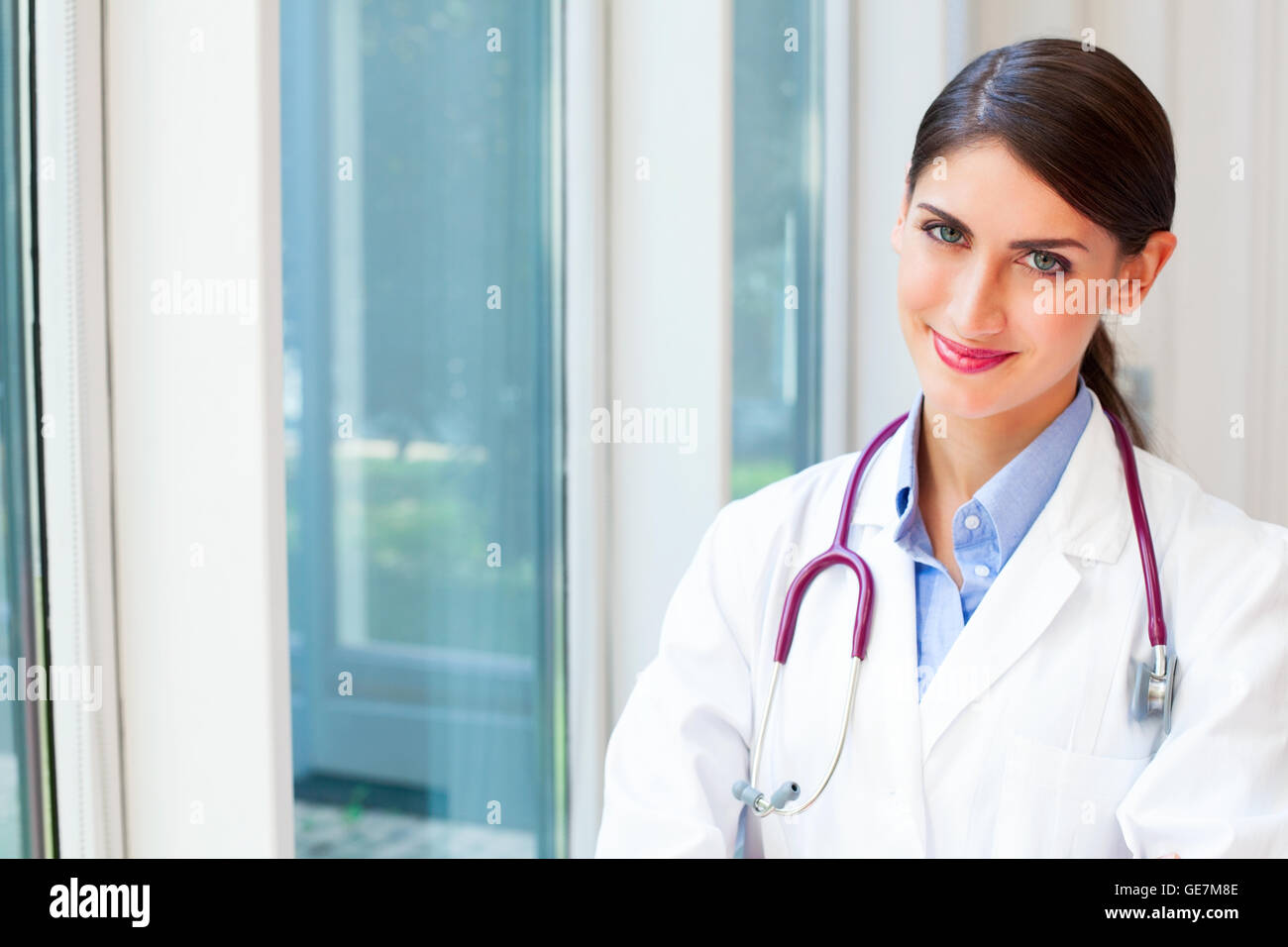 Portrait of smiling female doctor with stethoscope around neck