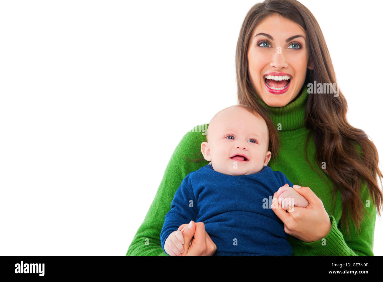 A photo of cheerful woman with baby boy. Happy mother and son are wearing casuals. They are spending leisure time isolated over Stock Photo