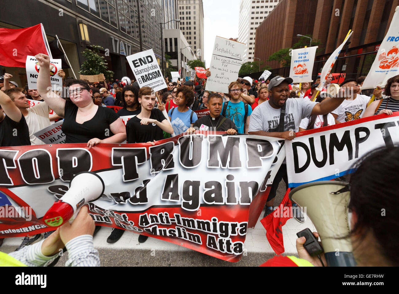 The Dump Trump rally marches through downtown Cleveland on July 18, 2016 outside the Republican National Convention. Stock Photo