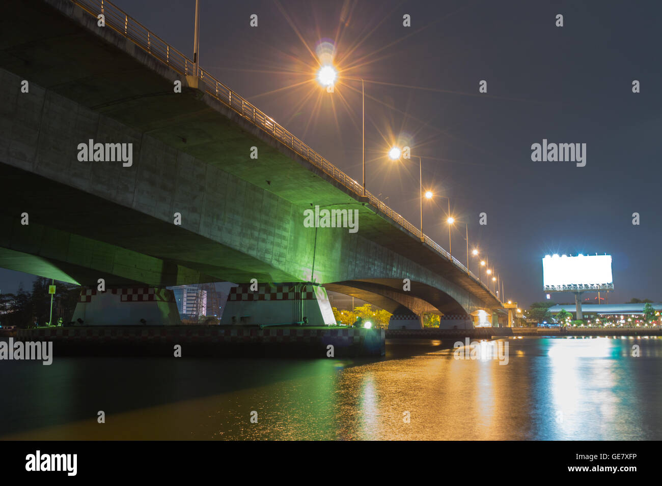 Bridge at night and billboards. Stock Photo