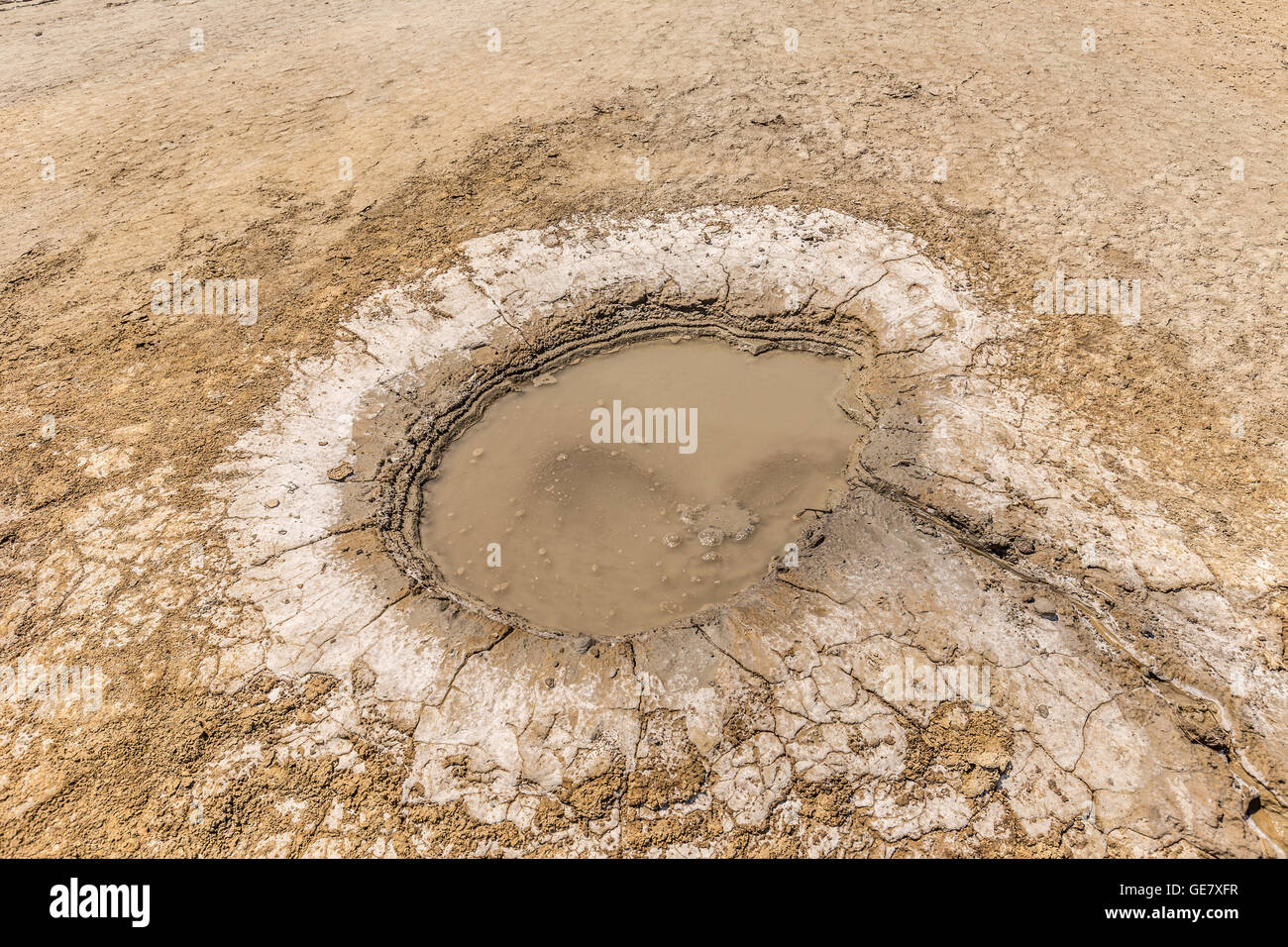 Small crater of a mud volcano Stock Photo