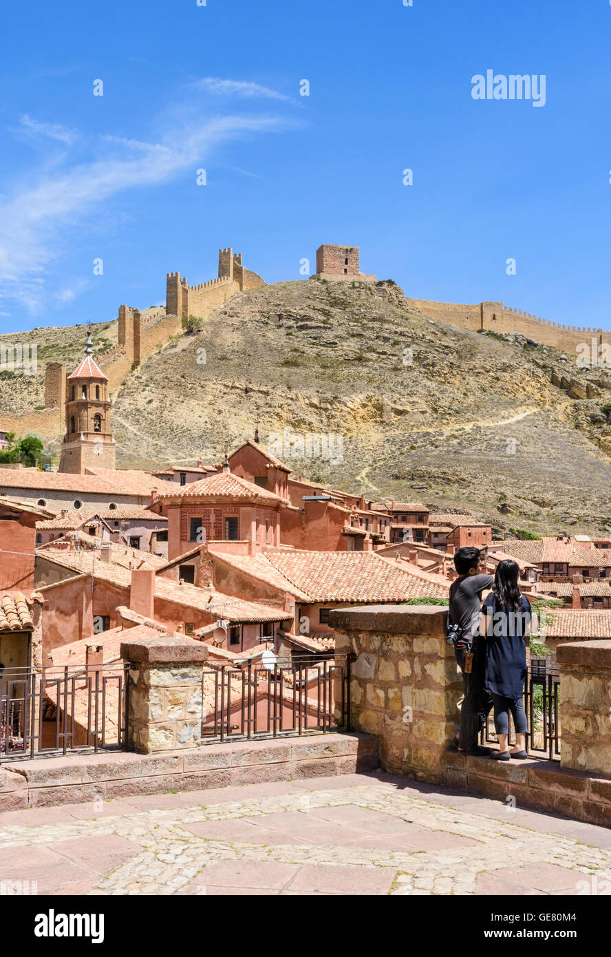 Tourists looking at the view from the Medieval walled town of Albarracin, Teruel, Aragon, Spain Stock Photo