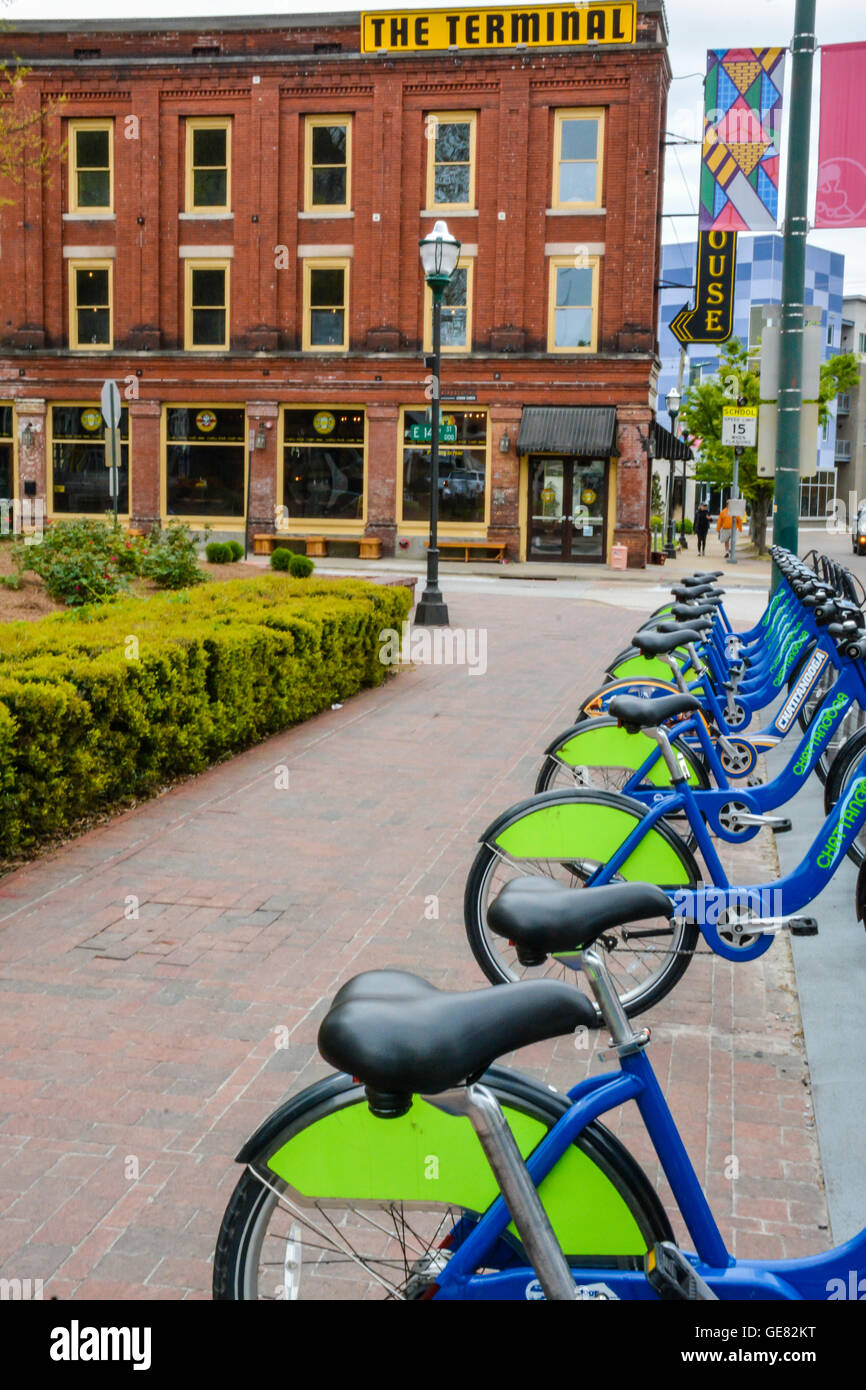 The Tennessee City of Chattanooga Bicycle Transit System Station have distinctively colorful bikes for rent in the Southside Stock Photo