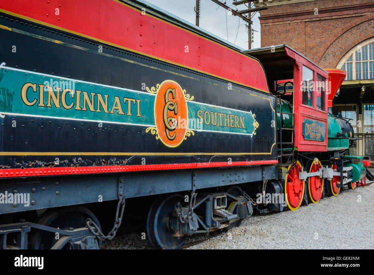 A colorful, vintage Cincinnati Southern railroad car in the rail yard