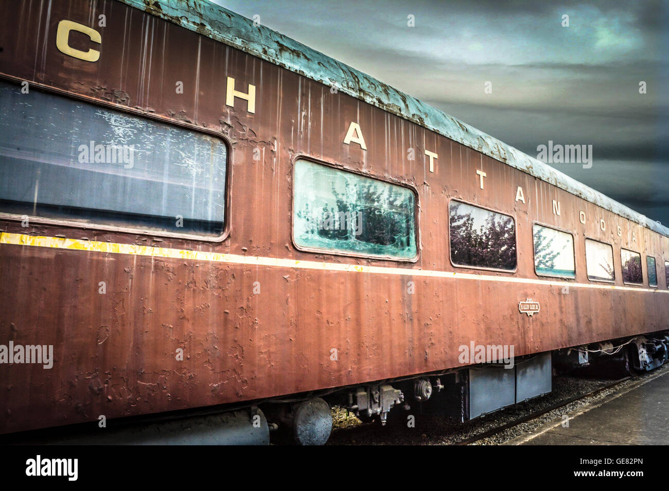 A vintage passenger train car converted to guests rooms, sits on the