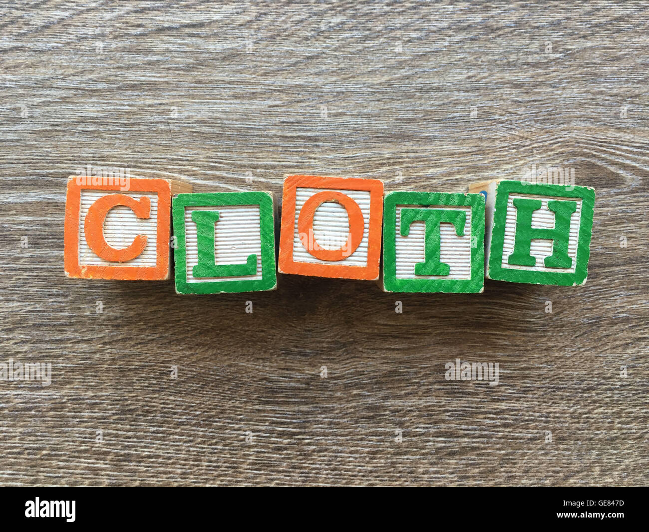 Wood blocks or wooden cubes toys with alphabet letters on them combined