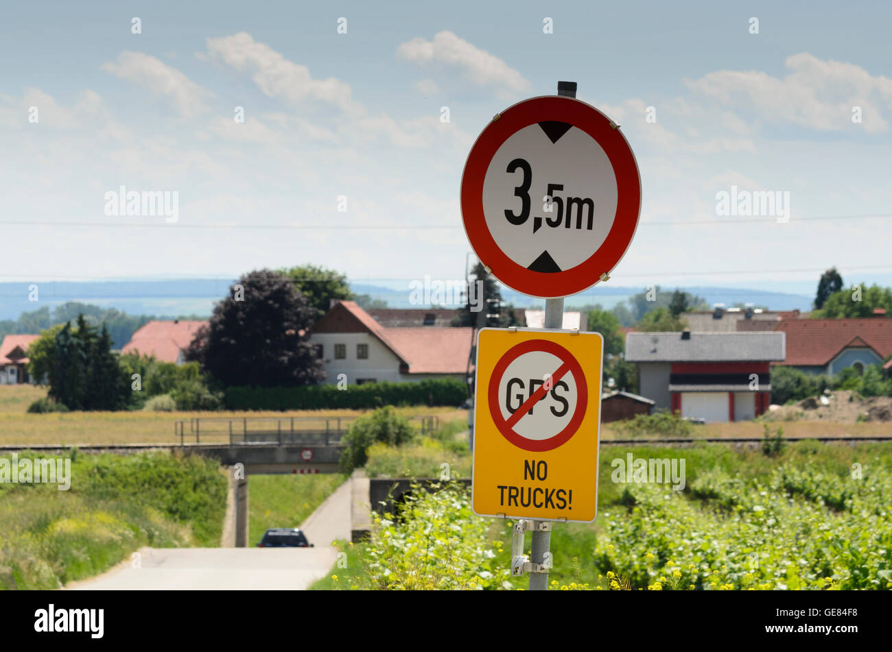 Sign for trucks that navigation devices incorrectly could recommend a drive through a low bridge, no GPS, Austria Stock Photo