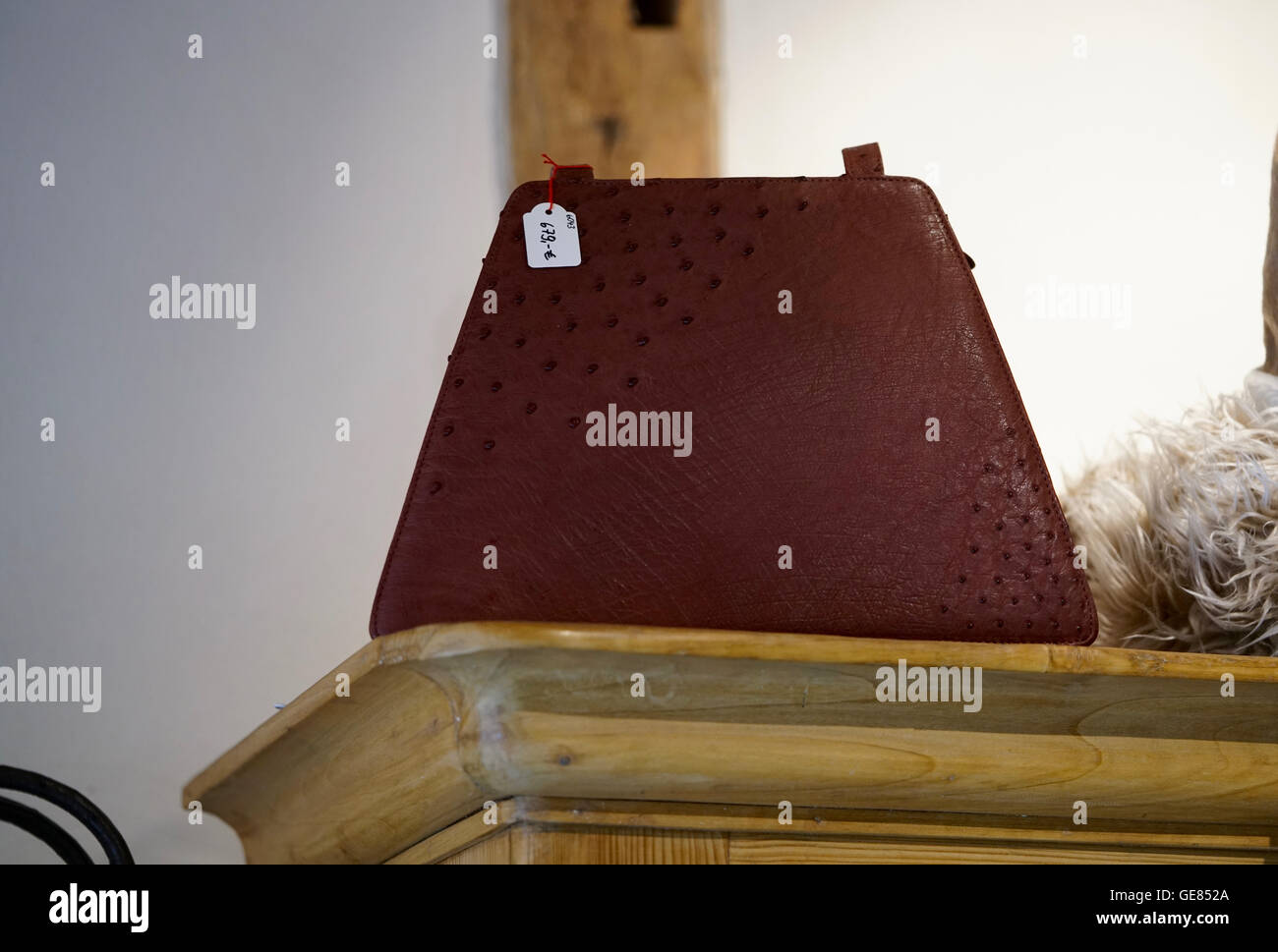 expensive red bag made of ostrich leather Stock Photo Alamy