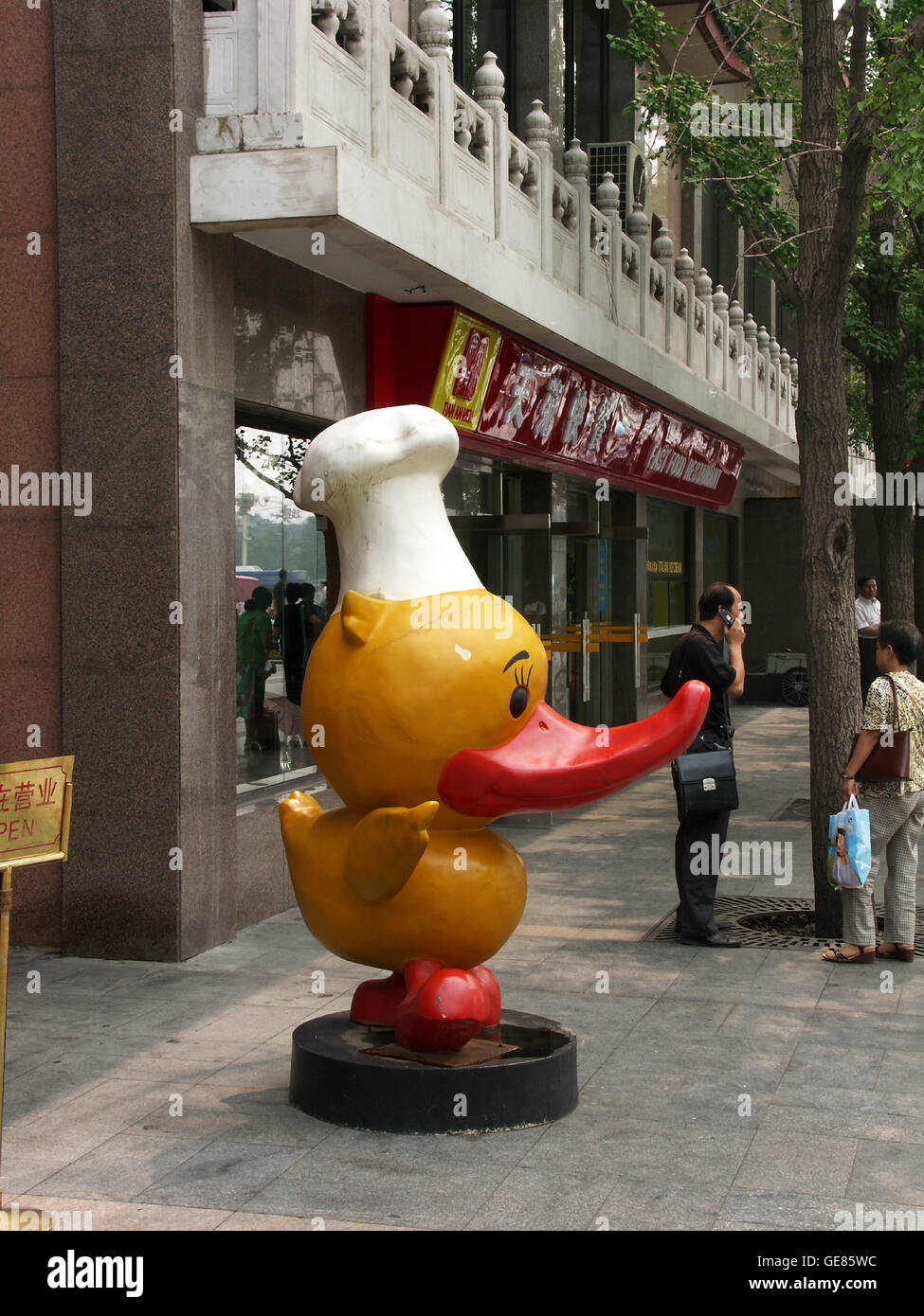 A cartoon duck advertises roast Peking duck, one of Beijing’s most famous dishes. China Stock Photo