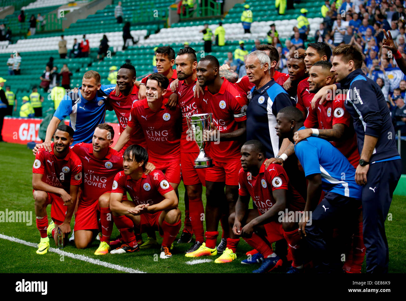 Leicester City players celebrate with the International Champions Cup trophy during the 2016 International Champions Cup match at Celtic Park, Glasgow. PRESS ASSOCIATION Photo. Picture date: Saturday July 23, 2016. See PA story SOCCER Celtic. Photo credit should read: Jane Barlow/PA Wire. RESTRICTIONS: EDITORIAL USE ONLY No use with unauthorised audio, video, data, fixture lists, club/league logos or 'live' services. Online in-match use limited to 75 images, no video emulation. No use in betting, games or single club/league/player publications. Stock Photo