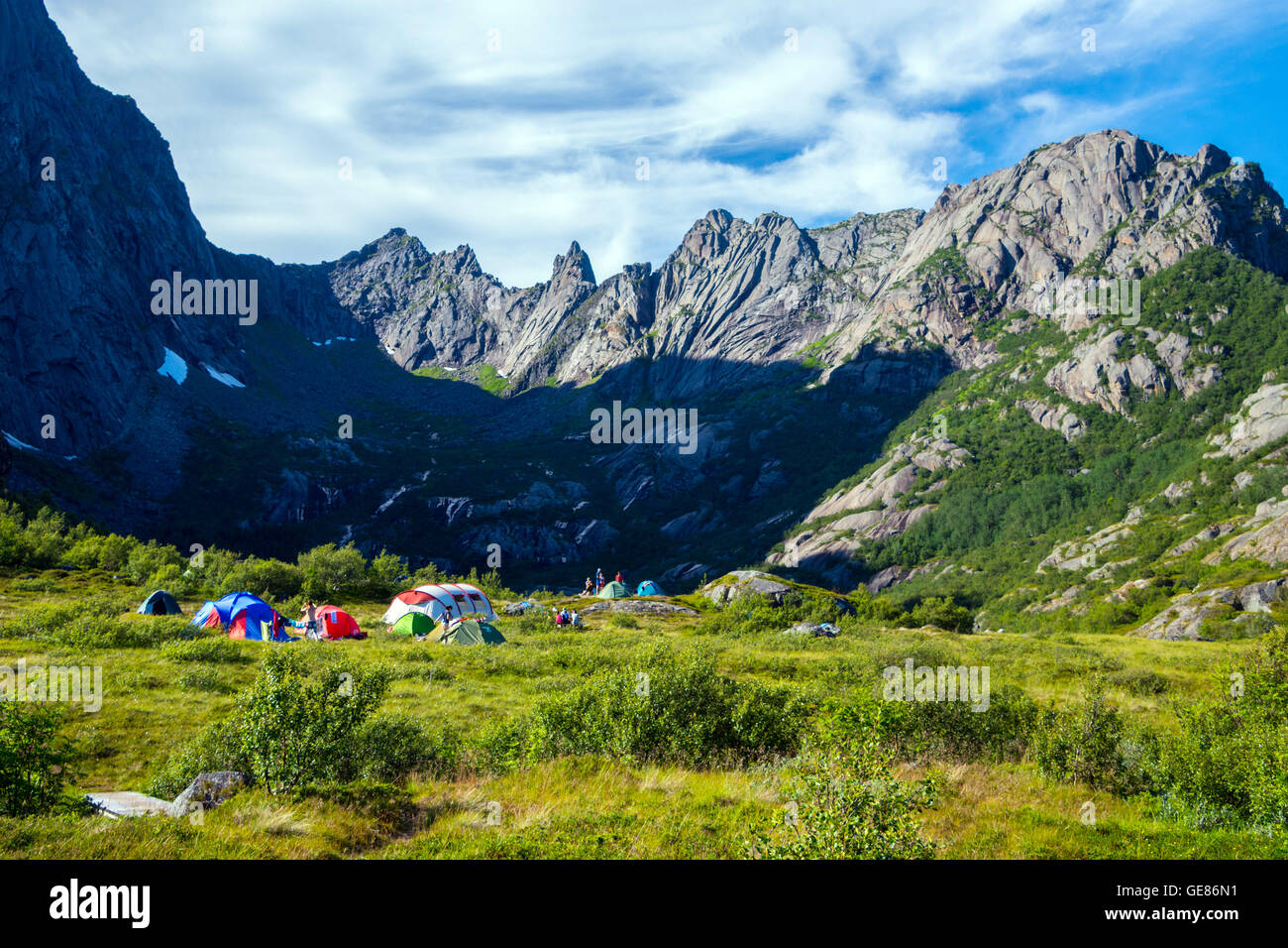 Colorful tents, wild camping group in mountains, Lofoten, Arctic Norway Stock Photo