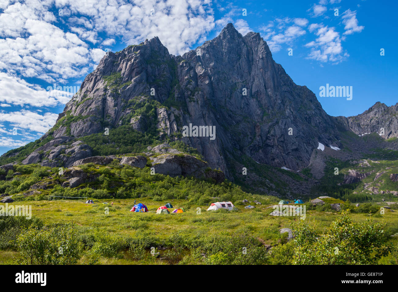 Colorful tents, wild camping group in mountains, Lofoten, Arctic Norway Stock Photo