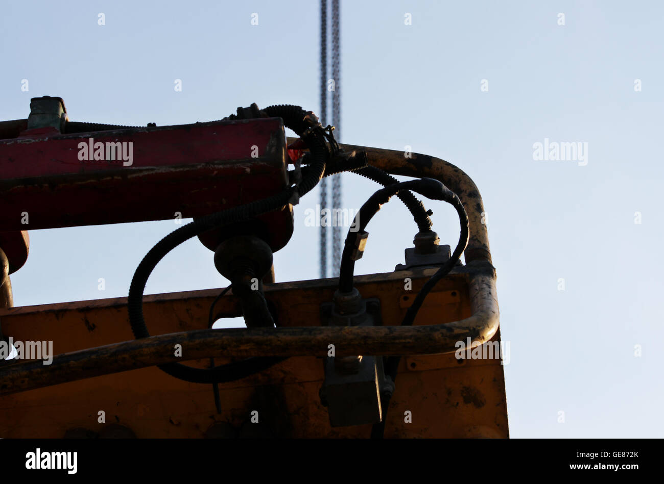 hoses and tubes of the hydraulic system from heavy machinery Machine to hammer the piles in