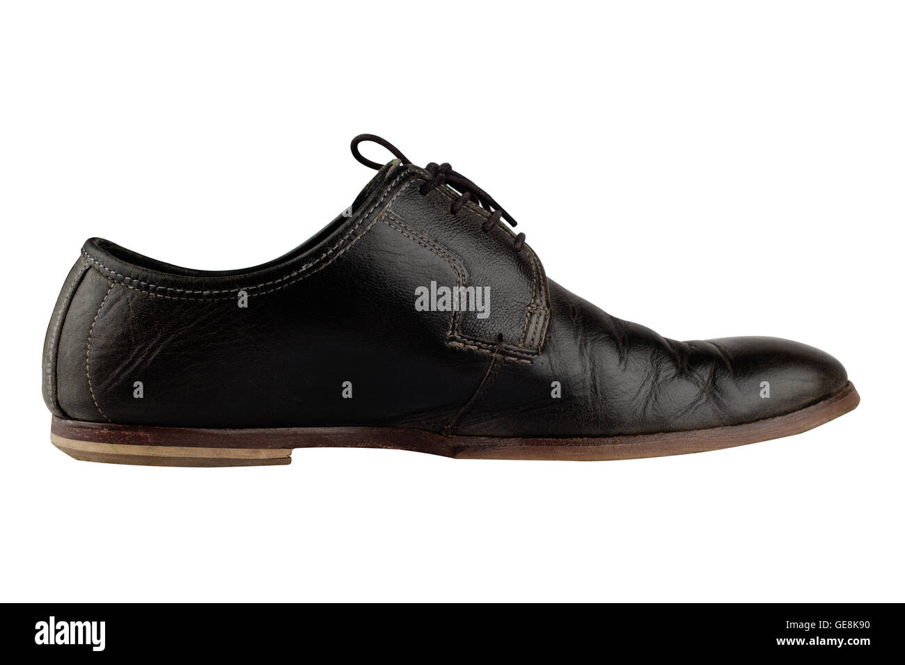 Horizontal side view of an elegant old black leather shoe isolated on ...