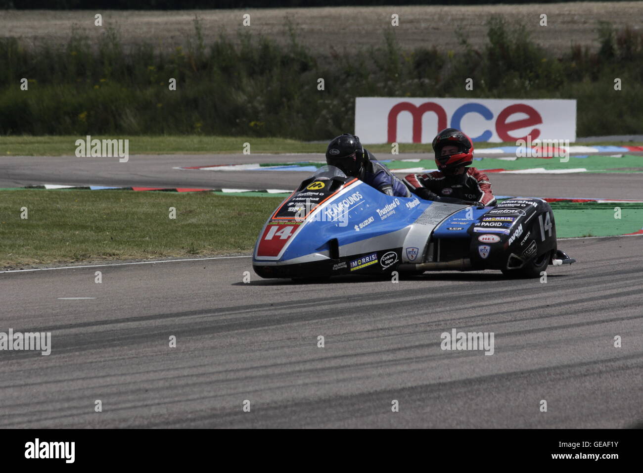 Alan Founds and Aki Alto riding in the qualifying rounds of the Hyundai Heavy Industries British Sidecars at Thruxton 23 July 2016. Stock Photo