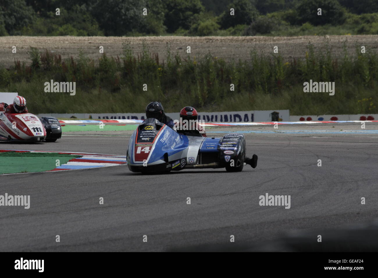 Alan Founds and Aki Alto riding in the qualifying rounds of the Hyundai Heavy Industries British Sidecars at Thruxton 23 July 2016. Stock Photo