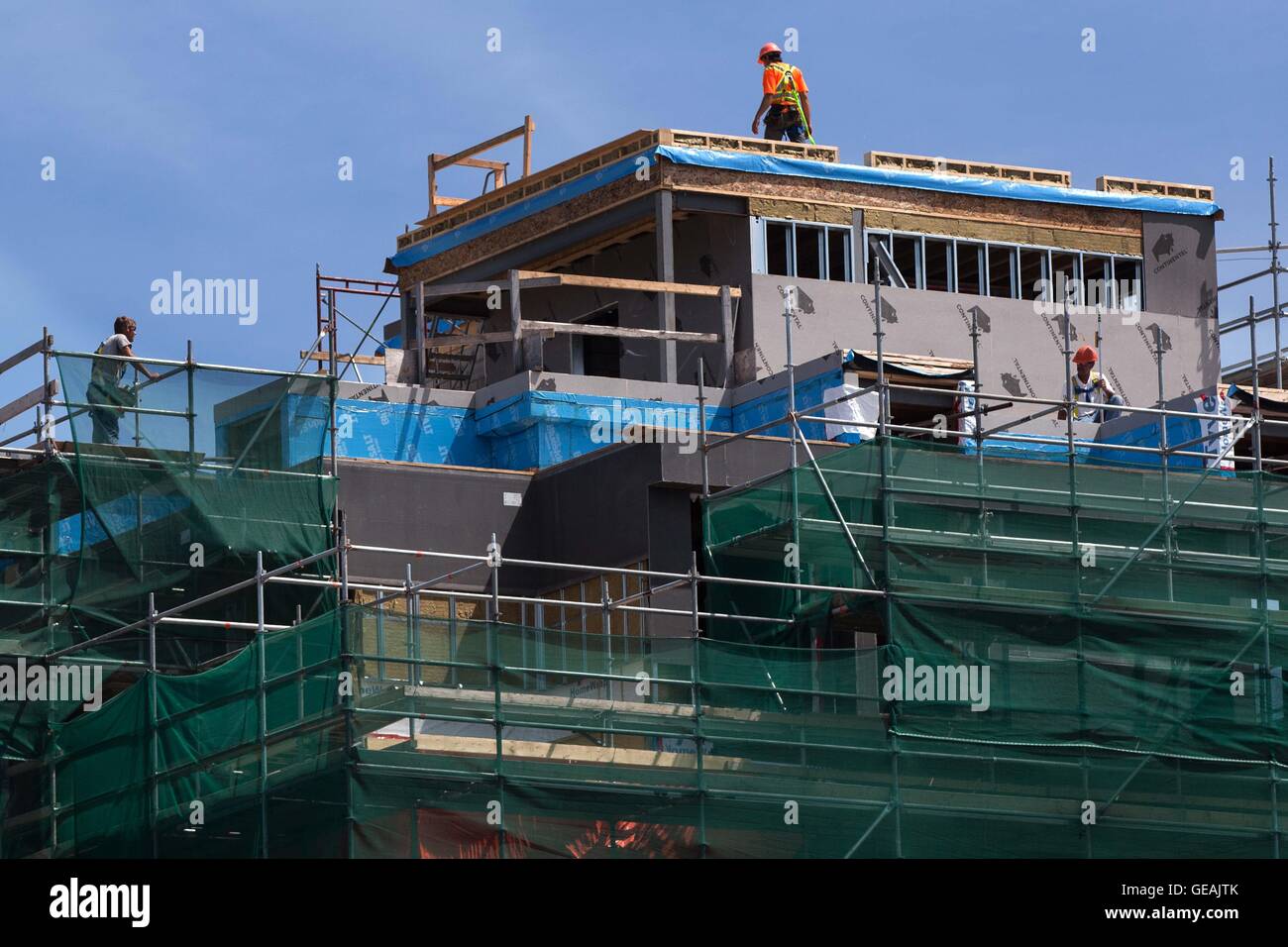 Kingston, Ontario, Canada. 11th July, 2016. Construction crew work on a