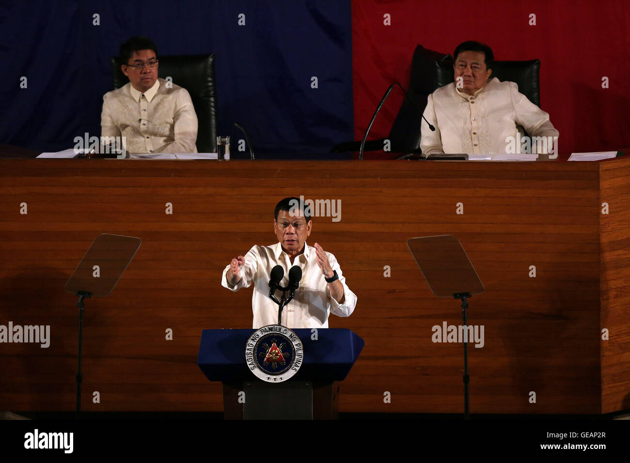 Quezon City, Philippines. 25th July, 2016. Philippine President Rodrigo Duterte (C) speaks during the State of the Nation Address in Quezon City, the Philippines, July 25, 2016. Philippine President Rodrigo Duterte declared, in his first State of the Nation Address on Monday, a unilateral ceasefire with the Communist Party of the Philippines-New People's Army-National Democratic Front. © Rouelle Umali/Xinhua/Alamy Live News Stock Photo