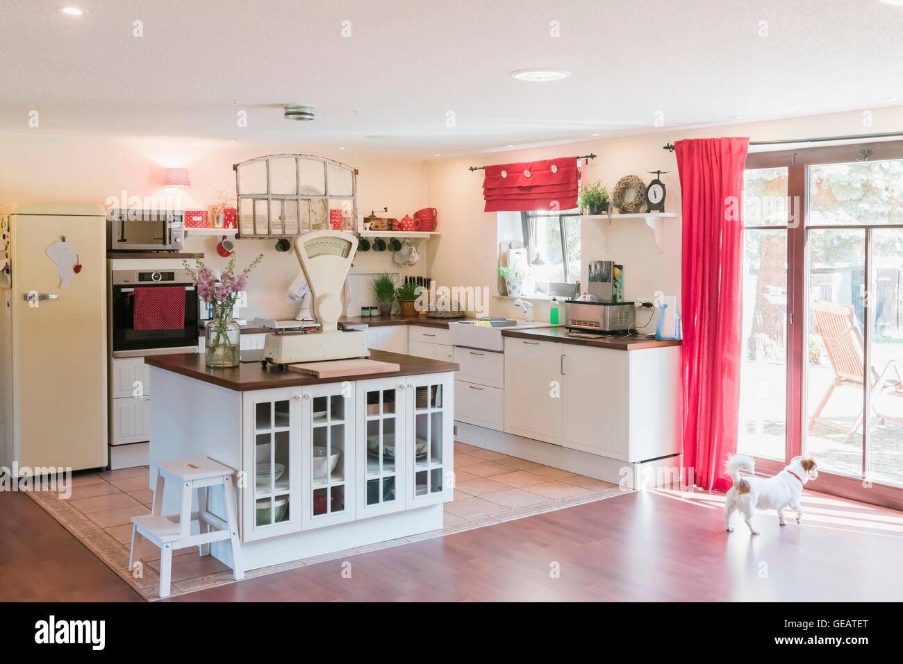 Open plan kitchen with kitchen island Stock Photo Alamy