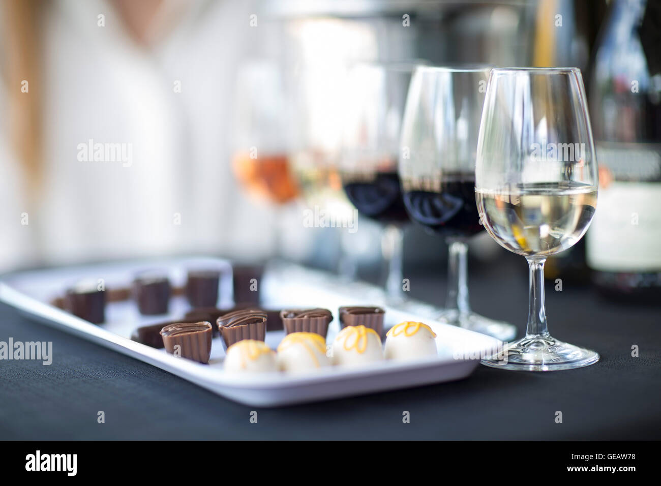 Wine degustation with chocolates Stock Photo