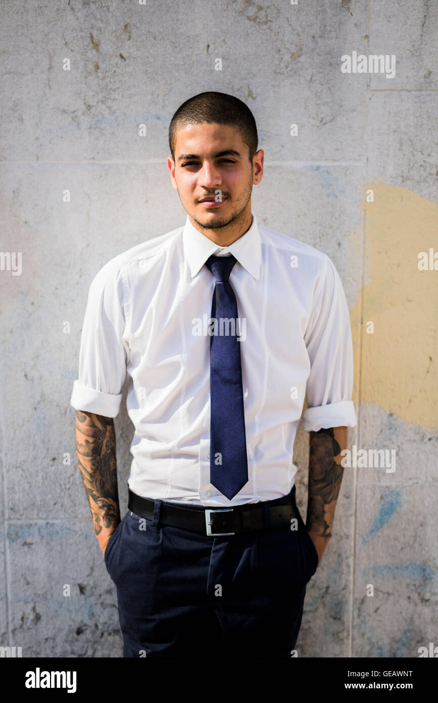 Portrait of young businessman with tattoos on his forearms Stock Photo - Alamy Portrait of young businessman with tattoos on his forearms Stock Photo - Alamy