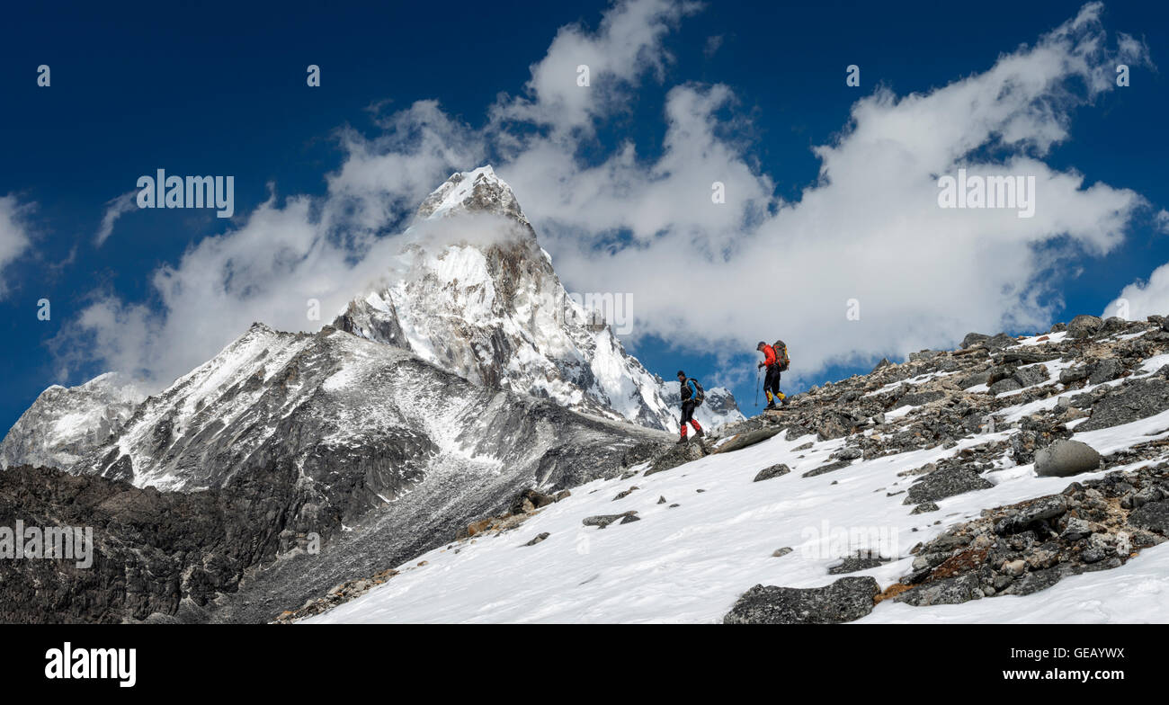 Nepal, Himalaya, Solo Khumbu, Ama Dablam, two men trekking Stock Photo