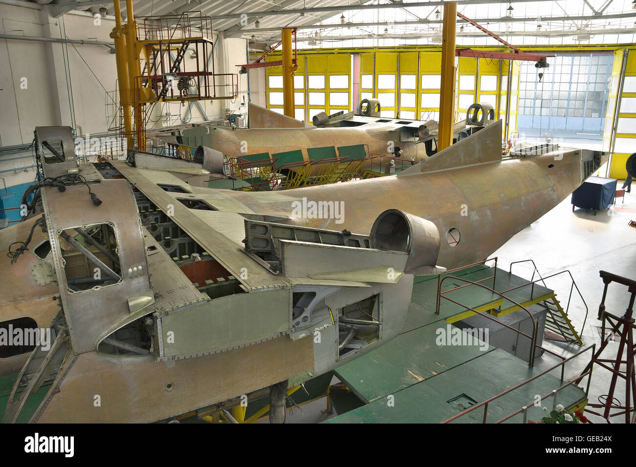 Kiev, Ukraine - July 7, 2012: Planes being assembled in hangar after a serious check and equipment upgrade Stock Photo