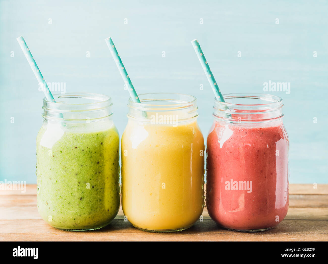 Freshly blended fruit smoothies of various colors and tastes Stock