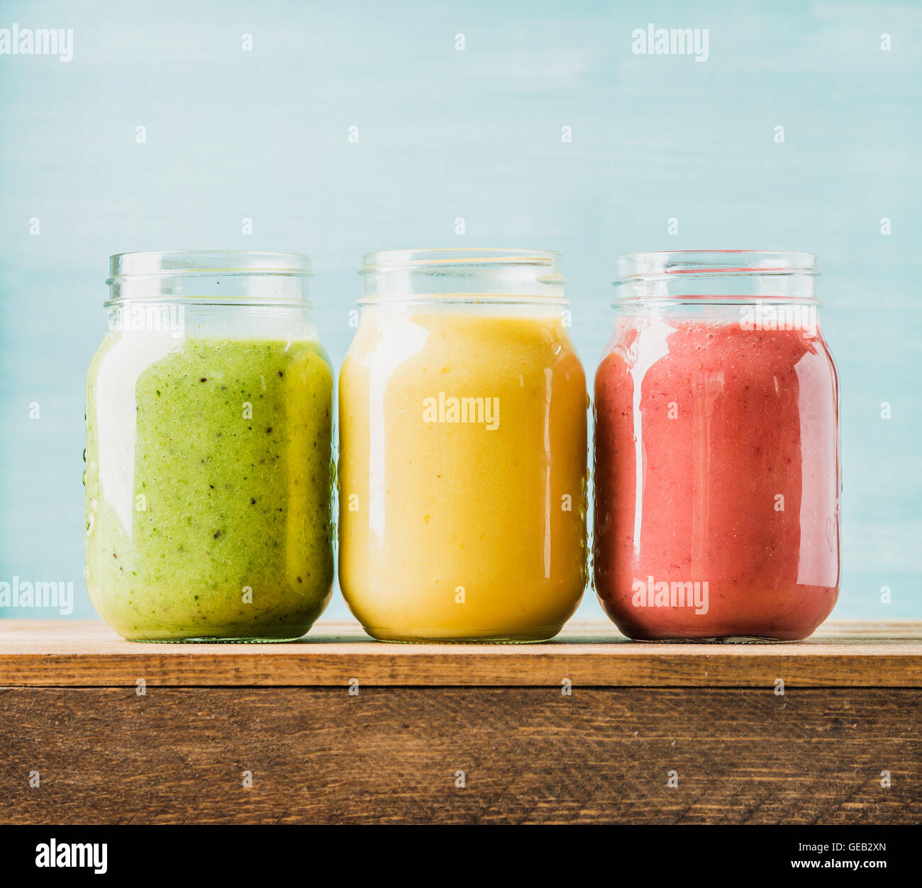 Freshly blended fruit smoothies of various colors and tastes Stock Photo