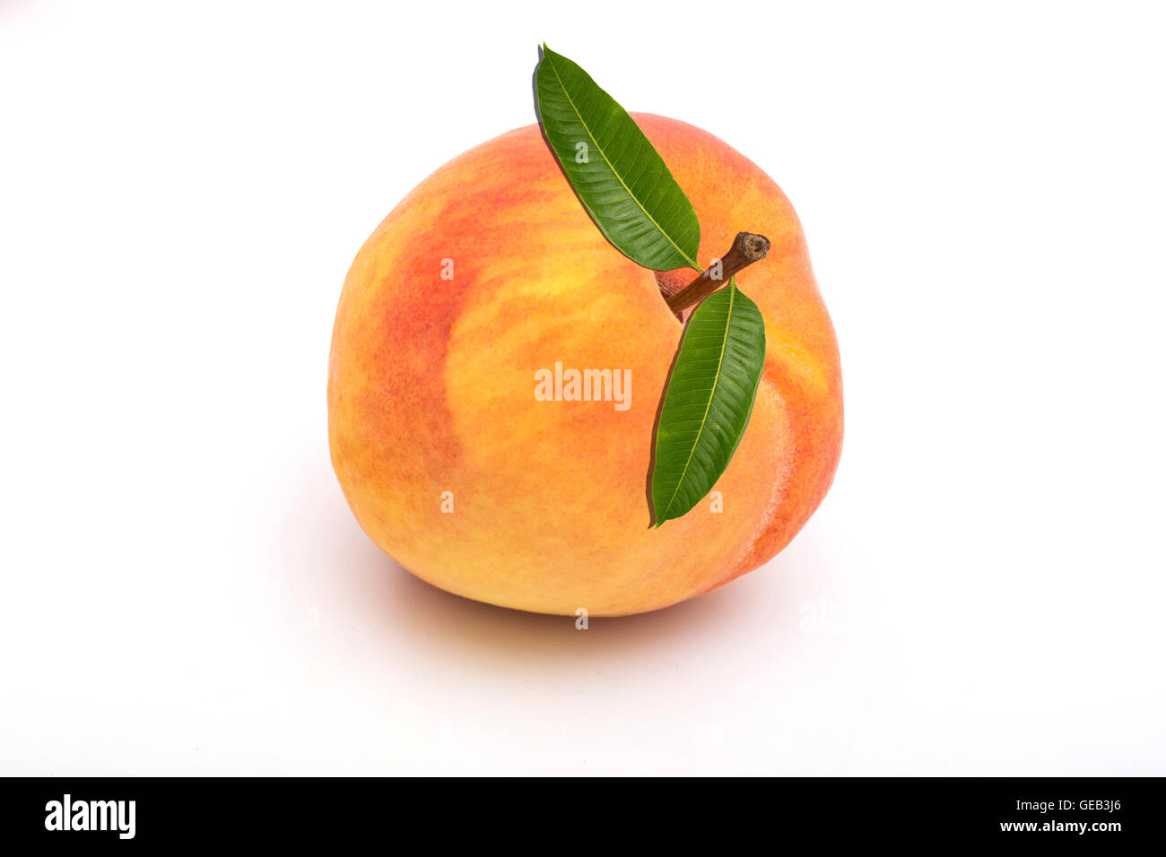 Peach with leaf isolated on white Stock Photo Alamy