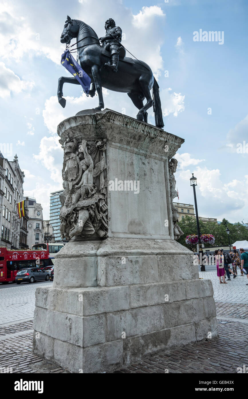An EU flag flies around the statue of King Charles 1 in Trafalgar Square, in London,  in protest against the Referendum result Stock Photo