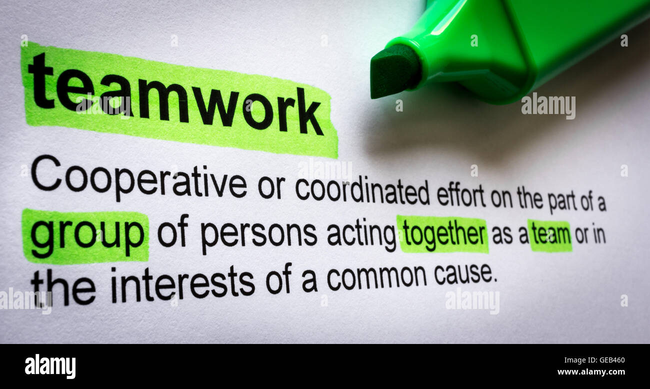 Definition of teamwork, highlighted in colour Stock Photo Alamy
