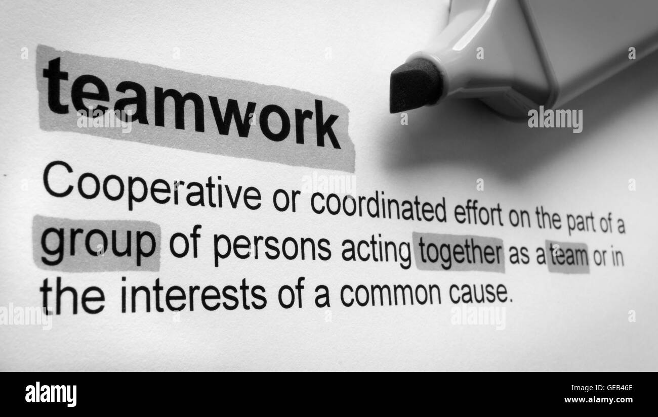 Definition of teamwork, highlighted in colour. Stock Photo