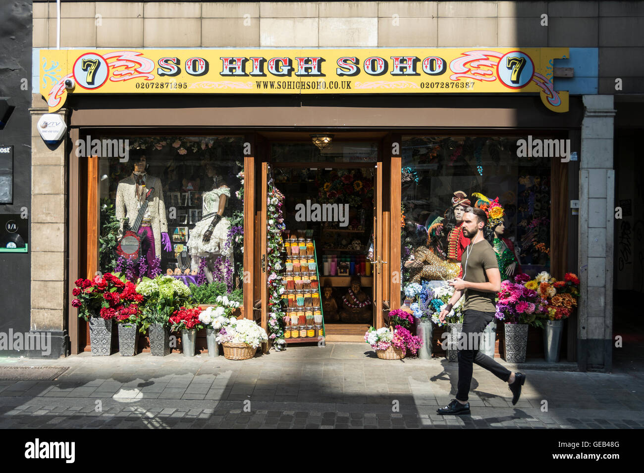 Man walking past flower shop hires stock photography and images Alamy