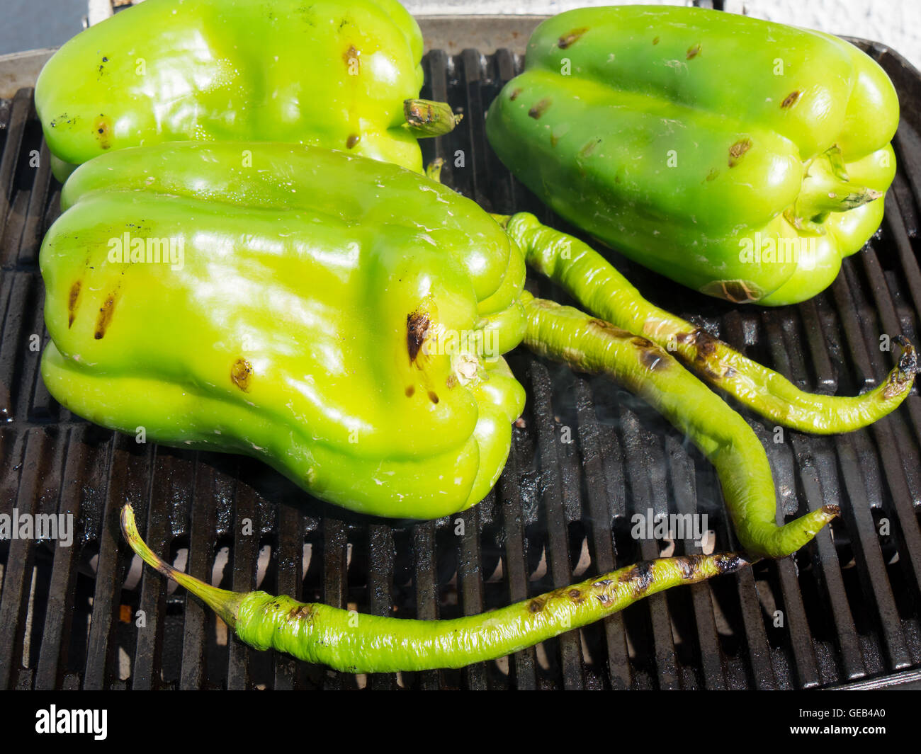 big green peppers grilled on the barbecue Stock Photo Alamy