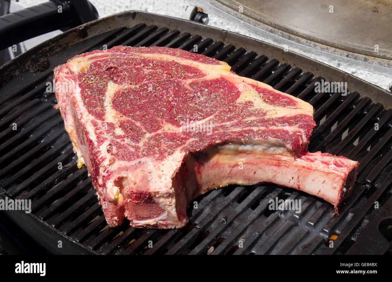a beautiful rib of beef to cook on the barbecue Stock Photo Alamy