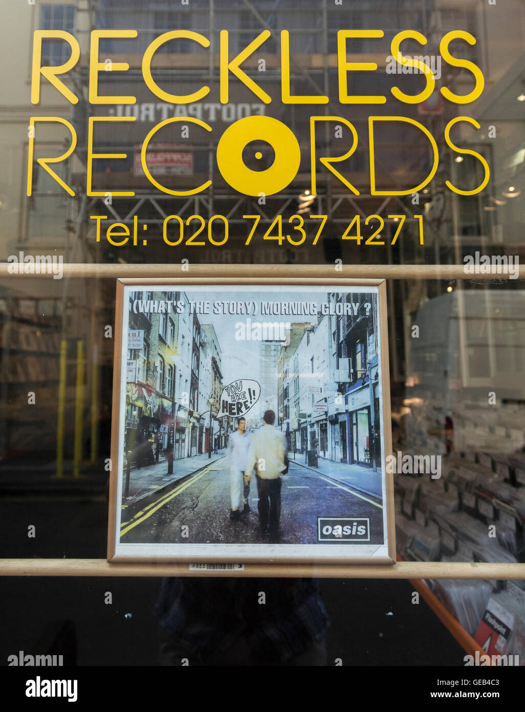 Oasis' What's the Story Morning Glory album cover in the shop window of Reckless Records in Soho, London, UK Stock Photo